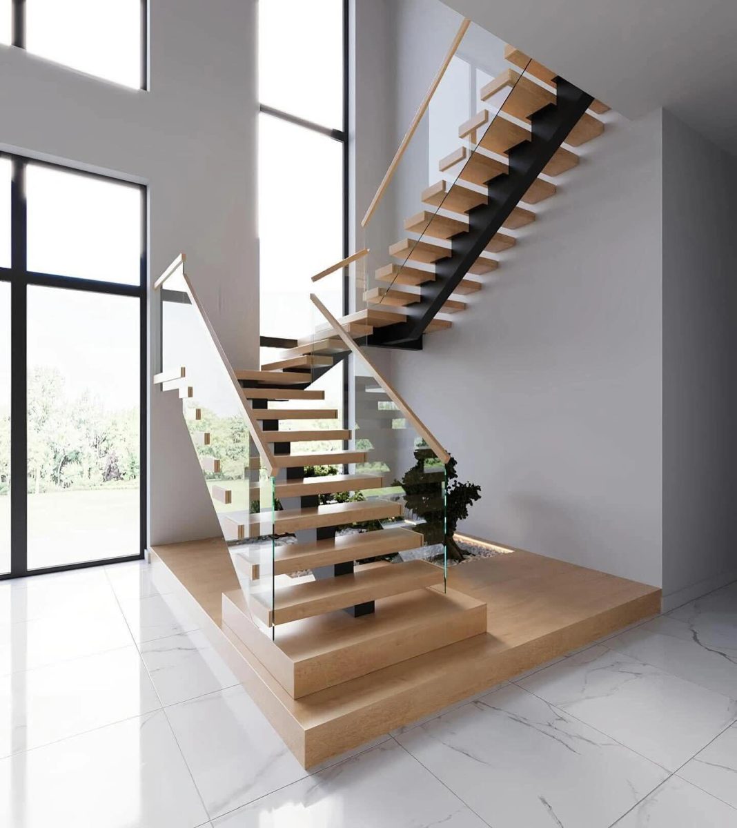 Escalier suspendu à limon central acier et garde-corps en verre