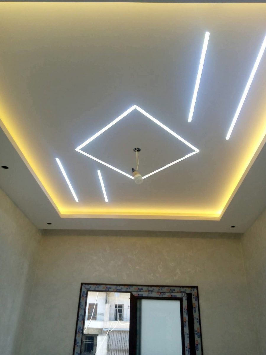 Faux plafond en plâtre à losange lumineux LED et rayons