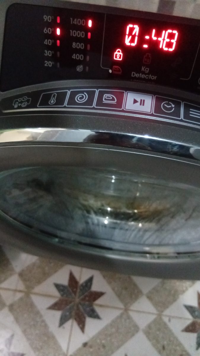 Bandeau de commande d'un lave-linge à hublot en marche