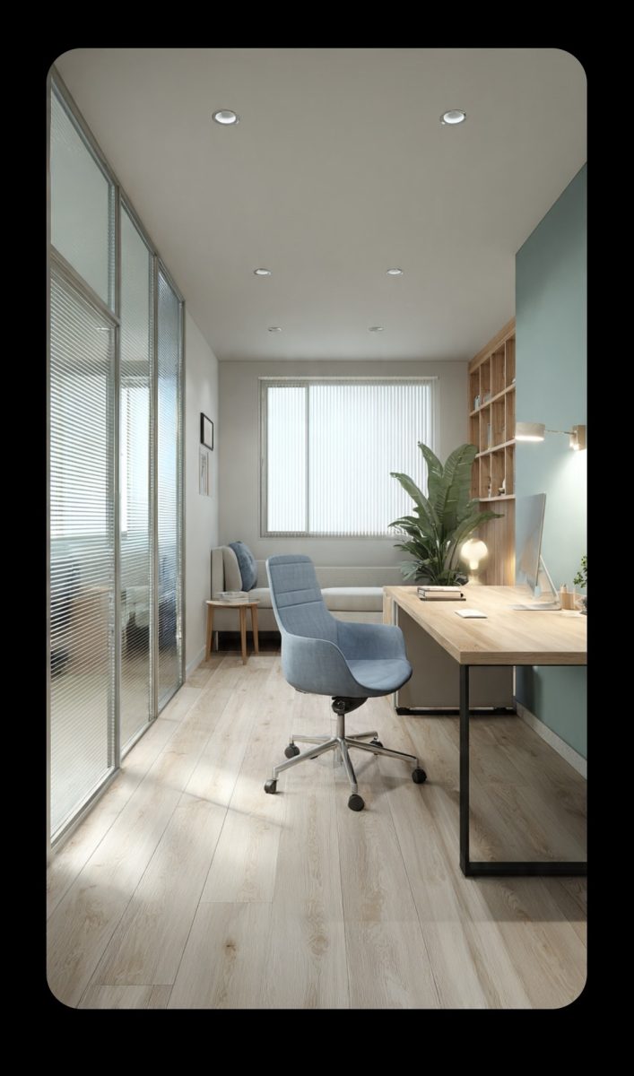 Bureau aménagé à fauteuil bleu et cloison vitrée
