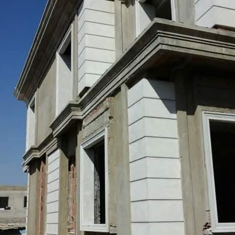 Façade de villa en parement pierre reconstituée en cours