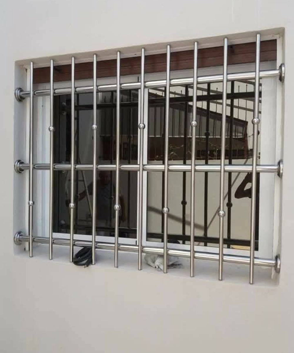 Grille de défense de fenêtre en inox poli à barreaux