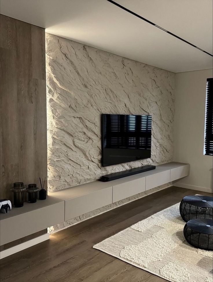 Séjour à mur TV en pierre rétro-éclairé et meuble bois