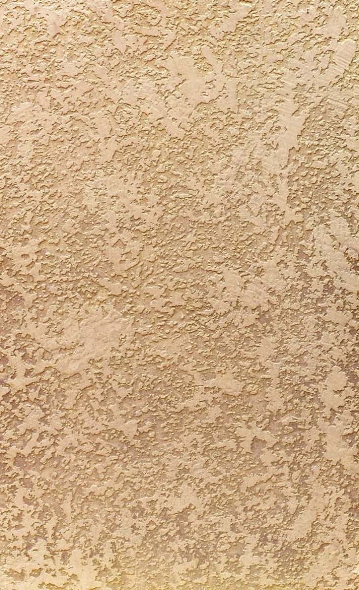 Mur en enduit décoratif beige texturé