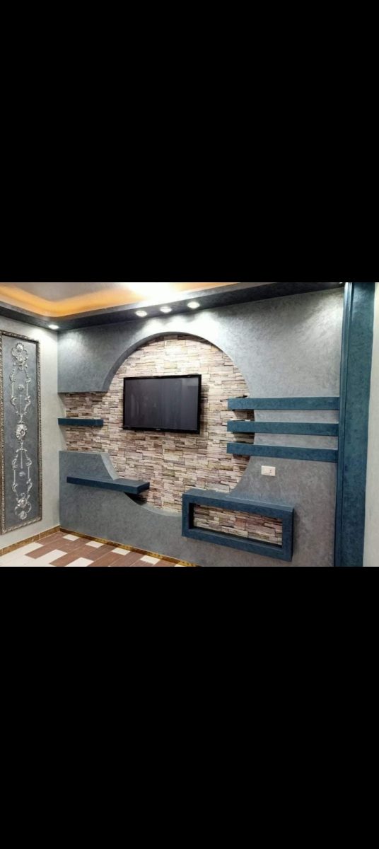 Meuble TV mural en plâtre à niche arquée en pierre
