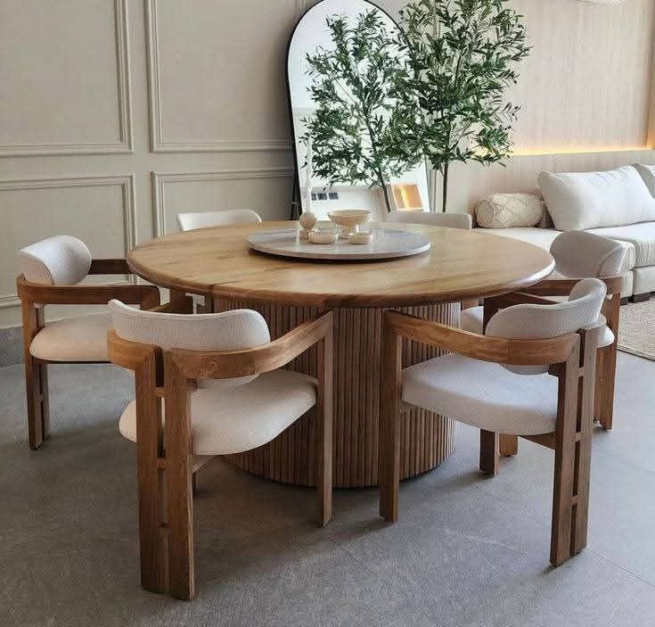 Rendu 3D d'un coin repas en bois à socle cannelé