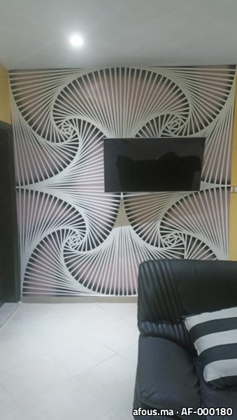 Mur TV en papier peint à motif de spirales géométriques