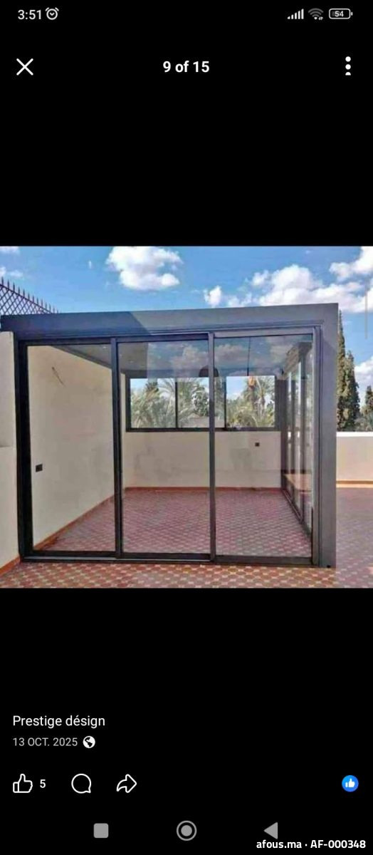 Véranda en aluminium gris sur toiture-terrasse — Mohammédia
