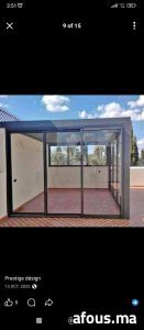 Véranda en aluminium gris sur toiture-terrasse — Mohammédia